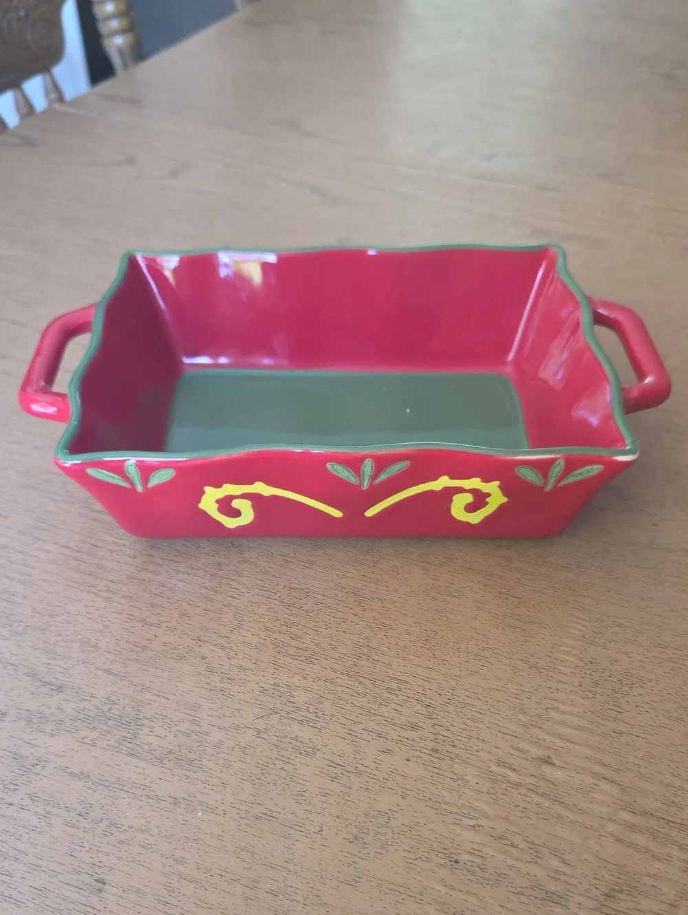 Red and Green Ceramic Serving Baker with Decorative Yellow Accents